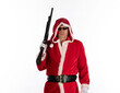 © serikbaib - Santa Claus killer with gun