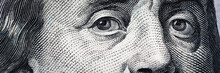 Benjamin Franklin's Eyes From A Hundred-dollar Bill. The Eyes Of Benjamin Franklin On The Hundred Dollar Banknote, Backgrounds, Close-up. 100 Dollar Bill With Only Eyes Of Benjamin Franklin.