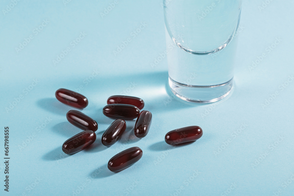 Diet, nutrition, healthy eating concept. Oil filled capsules of food