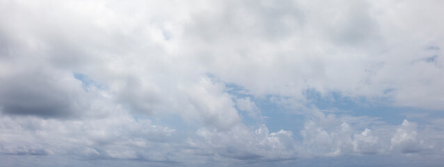 Wall Mural - panoramic grey sky with small blue sky patches
