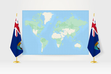 World Map between two hanging flags of Saint Helena flag stand.