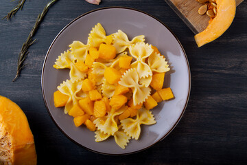 Wall Mural - Pasta with pumpkin. Vegetarian autumn dish.