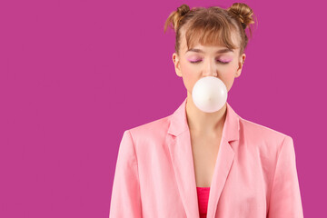 Sticker - Stylish young woman with chewing gum on purple background