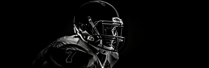 American football sportsman player on black background with copy space.