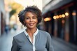 © Lumos sp - business businesswoman mature middle aged meeting woman portrait corporate city street outdoor urban outside manager executive entrepreneur black