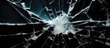 Fototapeta  - Broken shop window displaying shattered glass