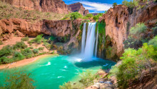 A View Of Havasu Falls From The Hillside Above The Falls The Turquoise Colored Water Flowing In To The Pool Below Is Surreal And One Of A Kind In The Desert Of Arizona