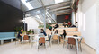 © ADDICTIVE STOCK - Bustling coworking space in Madrid