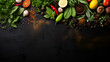 
A set of spices and herbs. Indian cuisine. Pepper, salt, paprika, basil, turmeric. On a black wooden board. View from above. Free space for copying