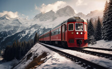 An Red Train Traveling Down A Snowy Mountainside