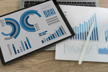 Wall Mural - KPI Business Analytics Finance graph chart report on the tablet screen.Data Analytics Statistics Information Business Technology