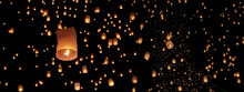 Tourist Floating Sky Lanterns In Loy Krathong Festival , Chiang Mai ,Thailand.