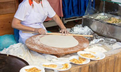 Poster - Cooking gozleme in the kitchen. National dish of Turkey