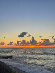Wall Mural - evening summer landscape with sunset, sea, sky and cloud.