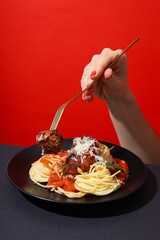 Wall Mural - Pasta with meatballs, concept of tasty and delicious food