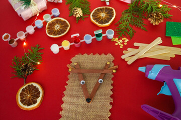 Wall Mural - Step by step instruction how to make christmas deer from ice cream sticks. Step 5 glue the eyes and noseChildren's New year handmade craft