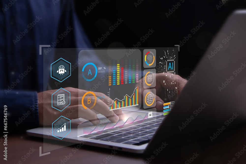 Analyst working with computer in Business Analytics and Data Management ...