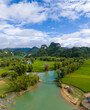 Aerial landscape in Quay Son river, Trung Khanh, Cao Bang, Vietnam with nature, green rice fields and rustic indigenous houses