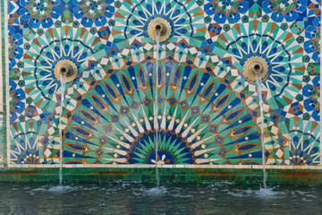 Wall Mural - The Hassan II Mosque exterior water fountain decorated with a beautiful moroccan mosaic pattern in Casablanca, Morocco.