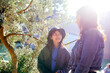 © Austockphoto - Aboriginal teacher talking to her female student outside in the school playground