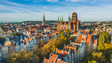 A magical image of Gdańsk at sunset. Urban landscape. Beautiful Main Town with old tenement houses.
