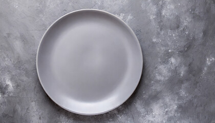 empty gray plate on gray rustic concrete background top view flat lay