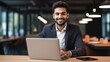 Smiling Adult Indian Man with Brown Straight Hair Photo. Portrait of Business Person in the office in front of laptop. Photorealistic Ai Generated Horizontal Illustration.