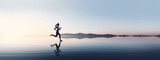 Fototapeta Natura - young woman running in a serene and minimalist landscape, panorama sport banner, pro training in nature for a marathon, motivation concept wallpaper, soft sky