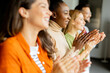 © BGStock72 - Young multiethnic startup team standing and applauding in the modern office