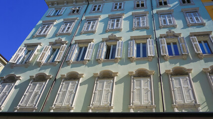 Wall Mural - The streets of Trieste with the facades of old and colorful Mediterranean houses. Trieste at Italy