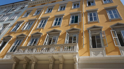 Wall Mural - The streets of Trieste with the facades of old and colorful Mediterranean houses. Trieste at Italy