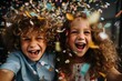 Children rejoice in confetti, brother and sister blow confetti from their palms, holiday and happiness, New year and Christmas