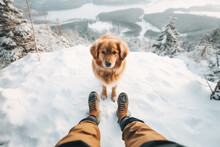 Cute Ginger Dog Standing By Owner Legs On Snowy Winter Mountains Landscape