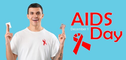 Sticker - Young man with red ribbon and condoms on light blue background. Banner for World AIDS Day