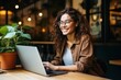  Young indian woman working on laptop in cafe and smiling generative ai