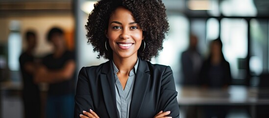 positive black woman in office showing leadership management development vision inspiration mission 