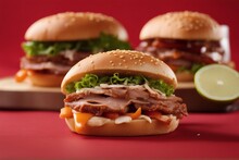 Three Puled Pork Sandwiches on a Red Background