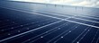 Polycrystalline silicon solar cells on a large factory roof in the Philippines generate solar power