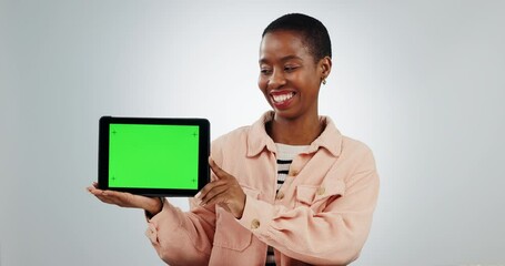 Wall Mural - Happy, marketing and a black woman with a green screen tablet for communication, information or web. Laughing, connection and face portrait of an African person with mockup space on studio background