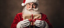Santa Claus Holding A Letter Addressed To Him At Christmas