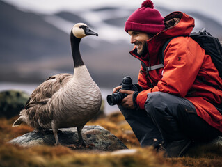 Wall Mural - A Photo of a Goose and a Wildlife Photographer in Nature