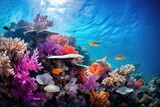 Fototapeta Do akwarium - An underwater photograph of a vibrant coral reef teeming with marine life.