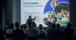 © Gorodenkoff - Corporate Event: Caucasian Female Tech CEO Giving Presentation To Colleagues or Investors In Conference Room Of Innovative Startup Company Office. Successful Woman Talking About Business Goals.