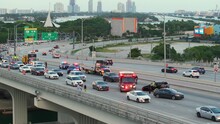 Car Crash Site In Miami With Emergency Services Personnel And Vehicles Responding To Accident On American Street. First Responders Helping Victims Of Vehicle Collision On Bridge Road In USA
