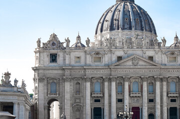 Wall Mural - Fragment of Basilica of St. Peter in the Vatican and column on Saint Peters square in Vatican