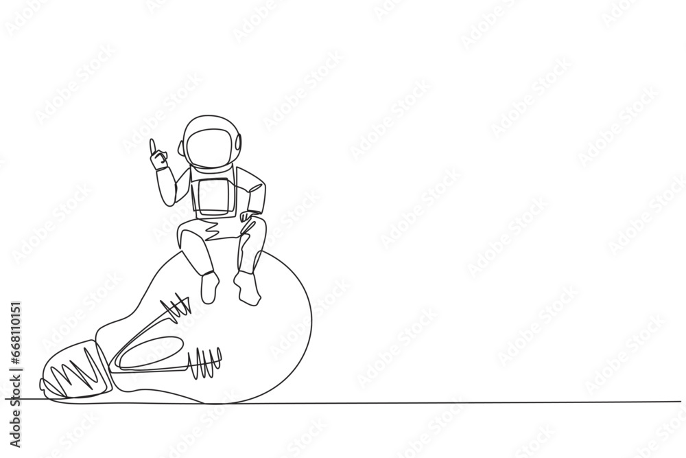 Continuous one line drawing young energetic astronaut sitting on big ...