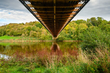 Beneath The Union Chain Bridge, A Suspension Road Bridge That Spans The River Tweed Between England And Scotland Located Four Miles Upstream Of Berwick Upon Tweed