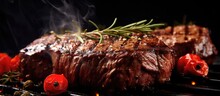 Beef Cooked On A Grill With A Blurry Background