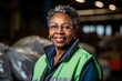 A woman at a waste processing plant. Garbage collection and disposal. Portrait with selective focus and copy space