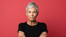 Portrait of a middle-aged woman model with short hair. Face expression. Isolated on a colored background. Generative AI.